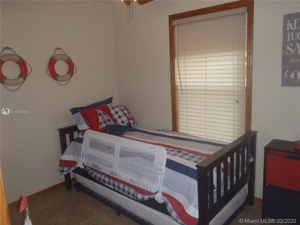 Bedroom 1, 60' x 100' Lot with Plenty of Open Yard Space, Ocean Side Property Across Community Boat Ramp & Park.