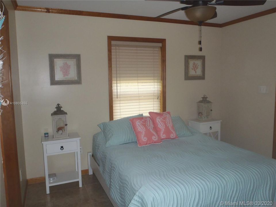 Master Bedroom View 1, 60' x 100' Lot with Plenty of Open Yard Space, Ocean Side Property Across Community Boat Ramp & Park.