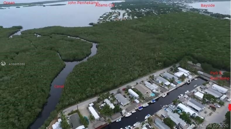 Waterway View of Park & Boat Ramp, Ocean, and Bay Access via Adams Cut. 60' x 100' Lot with Plenty of Open Yard Space, Ocean Side Property Across Community Boat Ramp & Park.