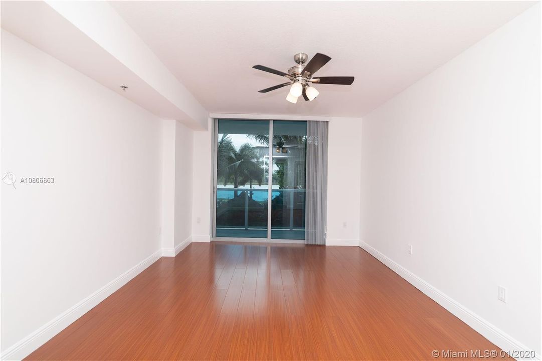 Large Master Suite with wood floors and a spacious balcony with breathtaking views