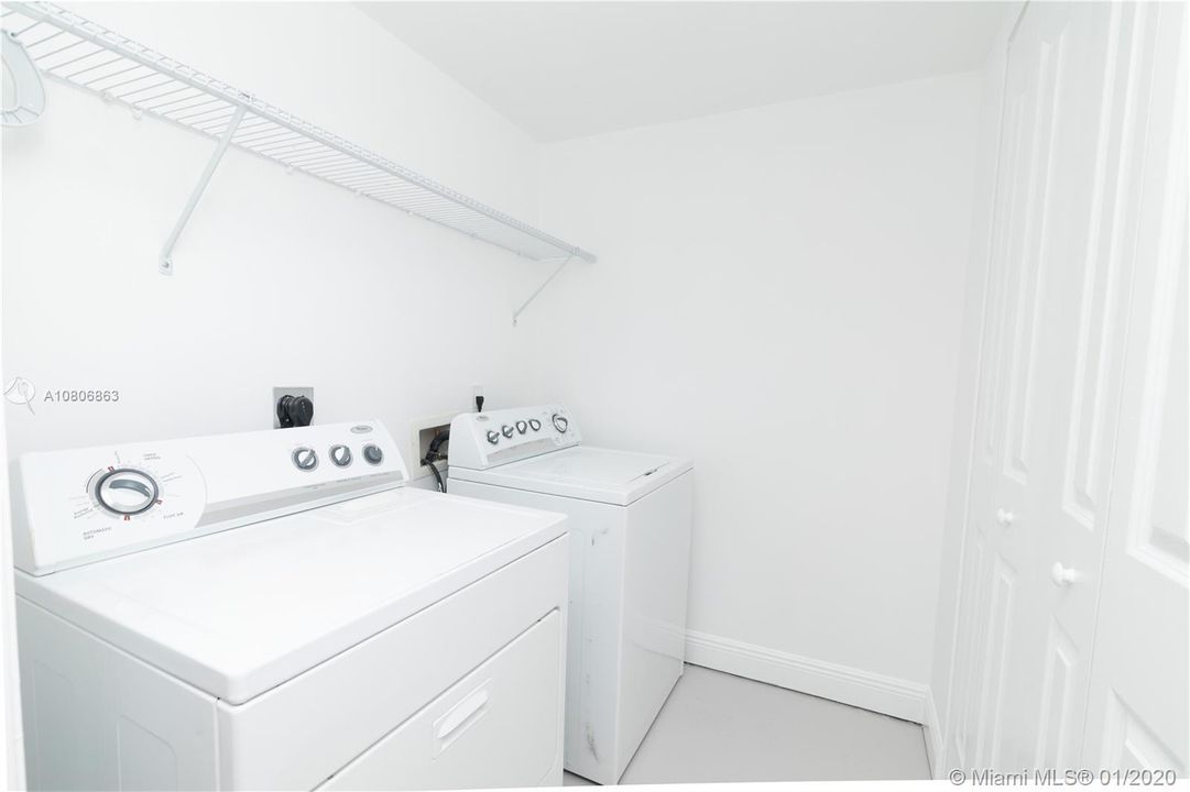 Spacious Laundry Room with lots of additional storage is conveniently located on the second floor