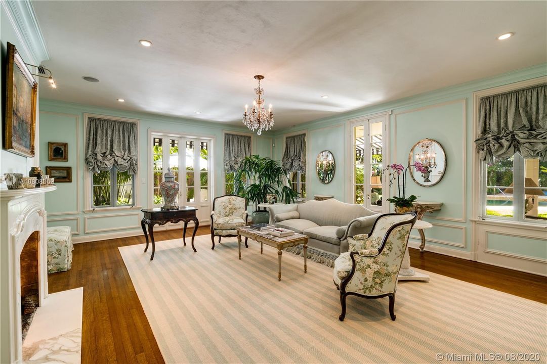 Elegant hardwood floors and fine millwork punctuate the room