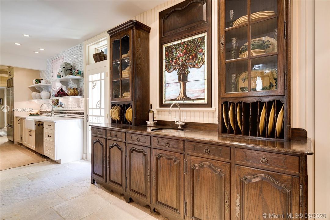 Fine craftsmanship is evident in detailed built-ins