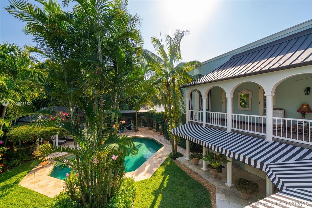 Tropical oasis just begins to describe this backyard