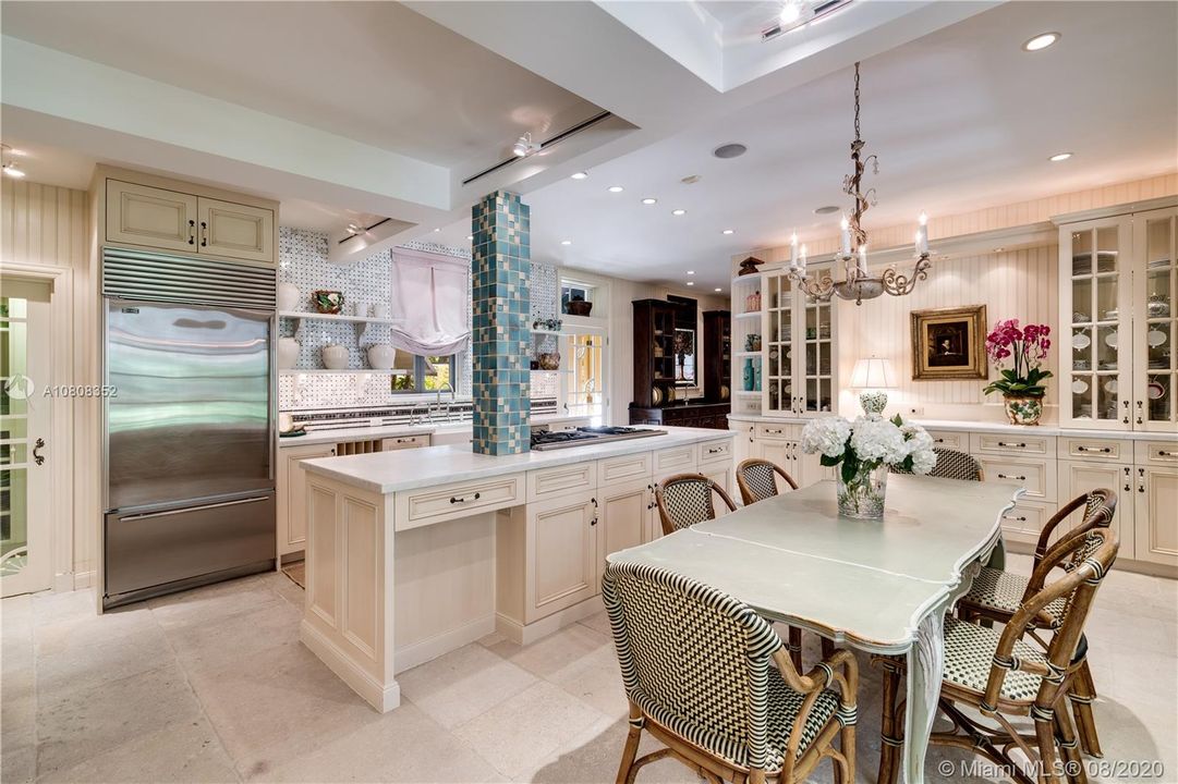 Italian limestone flooring anchor the kitchen