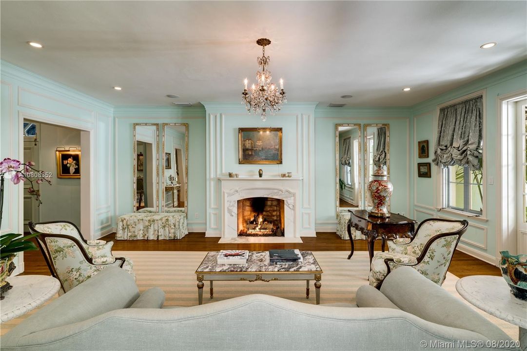 The grand formal living room evokes elegance and sophistication