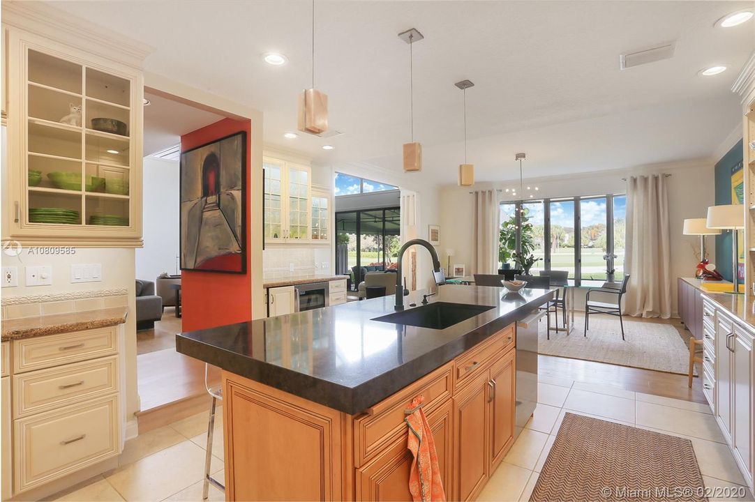 Professional Kitchen overlooking dining and golf course