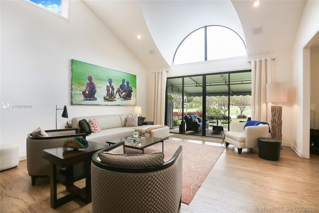 Great room overlooking private terrace and golf course