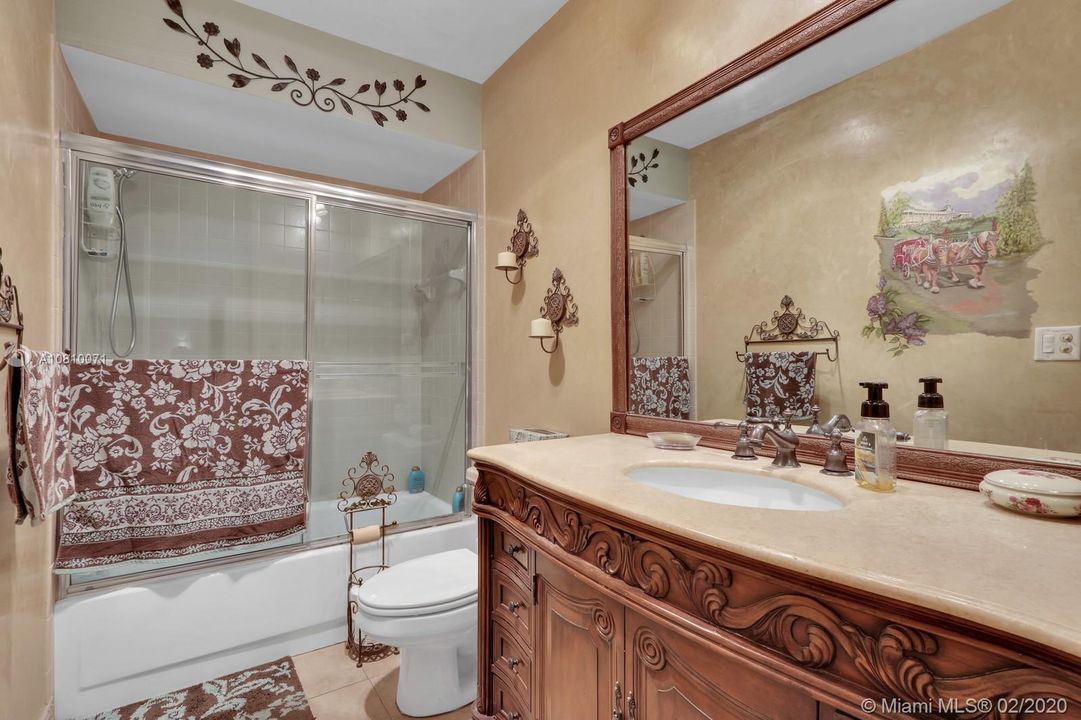 LOVELY GUEST BATHROOM FEATURES BEAUTIFUL CABINET
