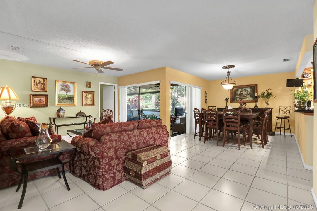 LIVING & DINING AREAS HAVE ACCESS TO THE SCREENED PATIO