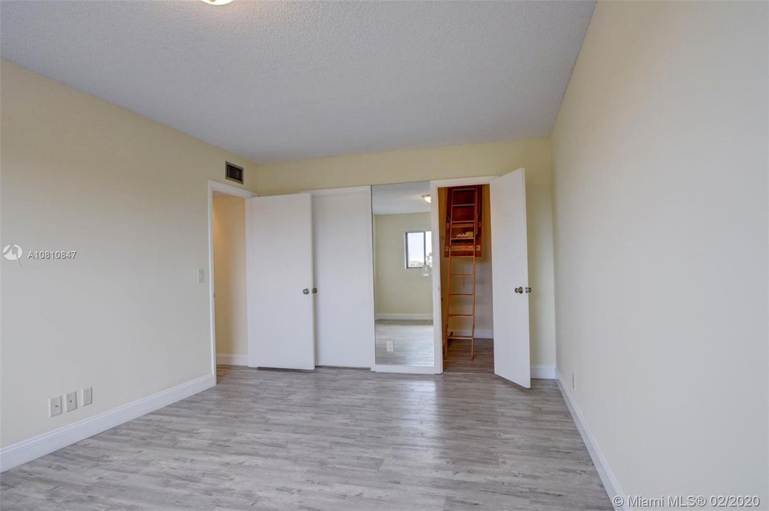 Master bedroom w/master bathroom & walk-in closet (stairs to the attic from the closet)