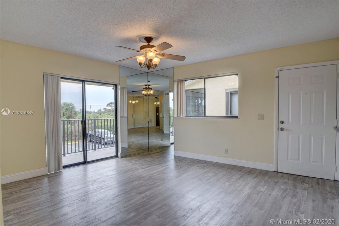 Living room w/front door 2