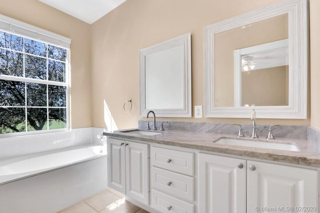 Master bath with marble counters.