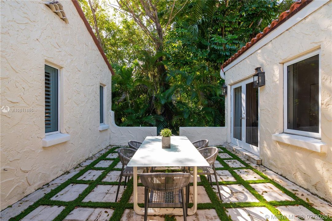 Intimate alfresco dining area off master bedroom suite