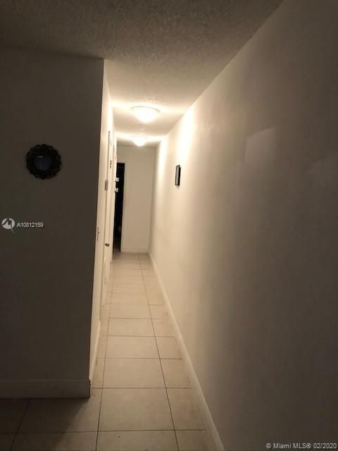 Hallway into 2 beds and 2 baths