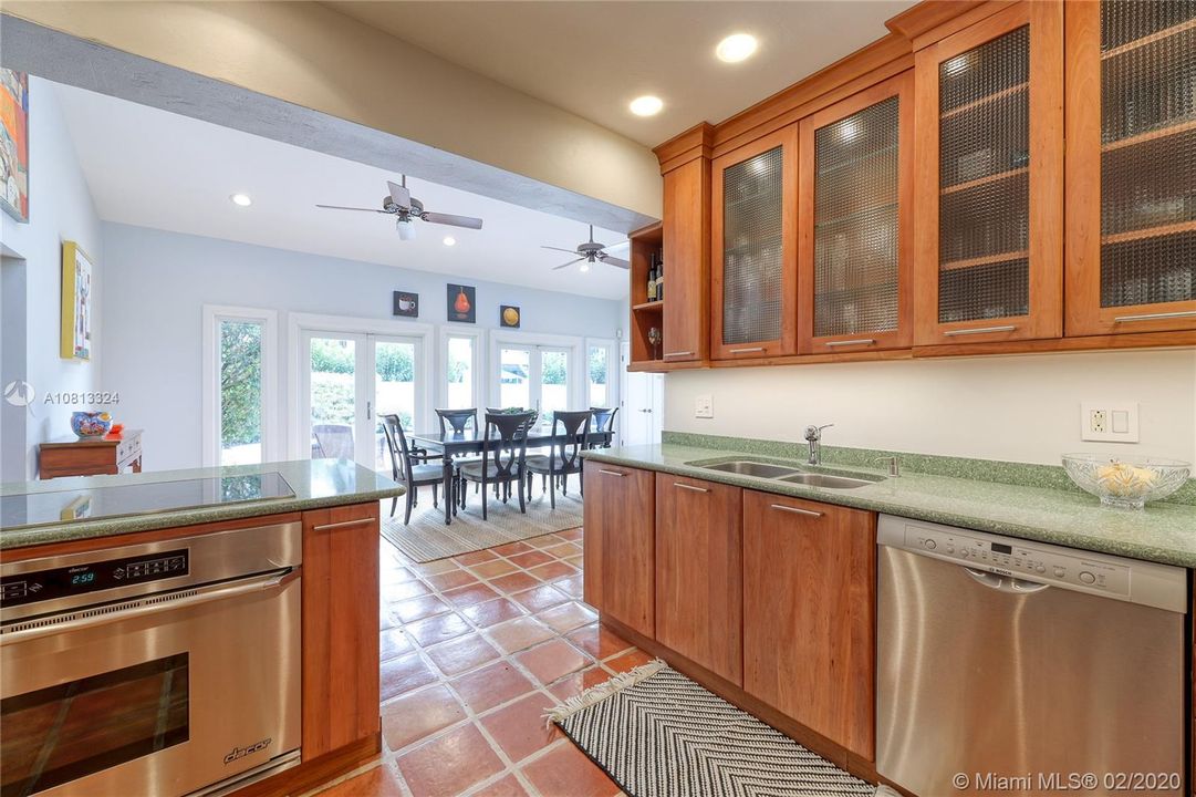 Imagine preparing dinner while you look out to the pool and your family