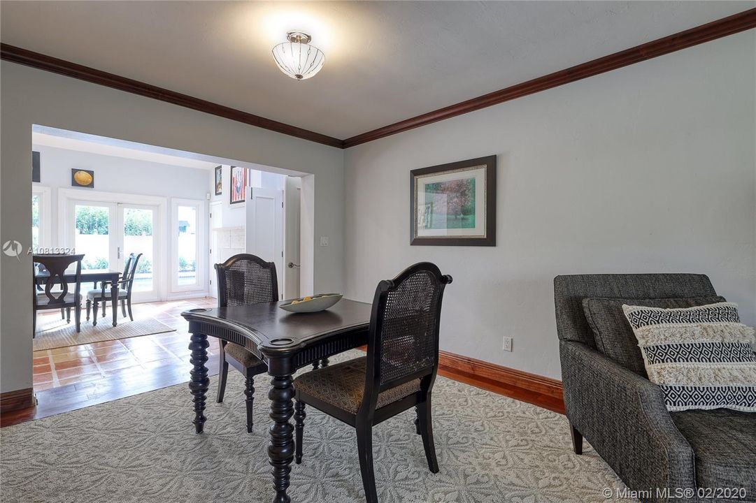 Dining Room being used as Card Room w/ Carpet in Wood Inlay Flooring