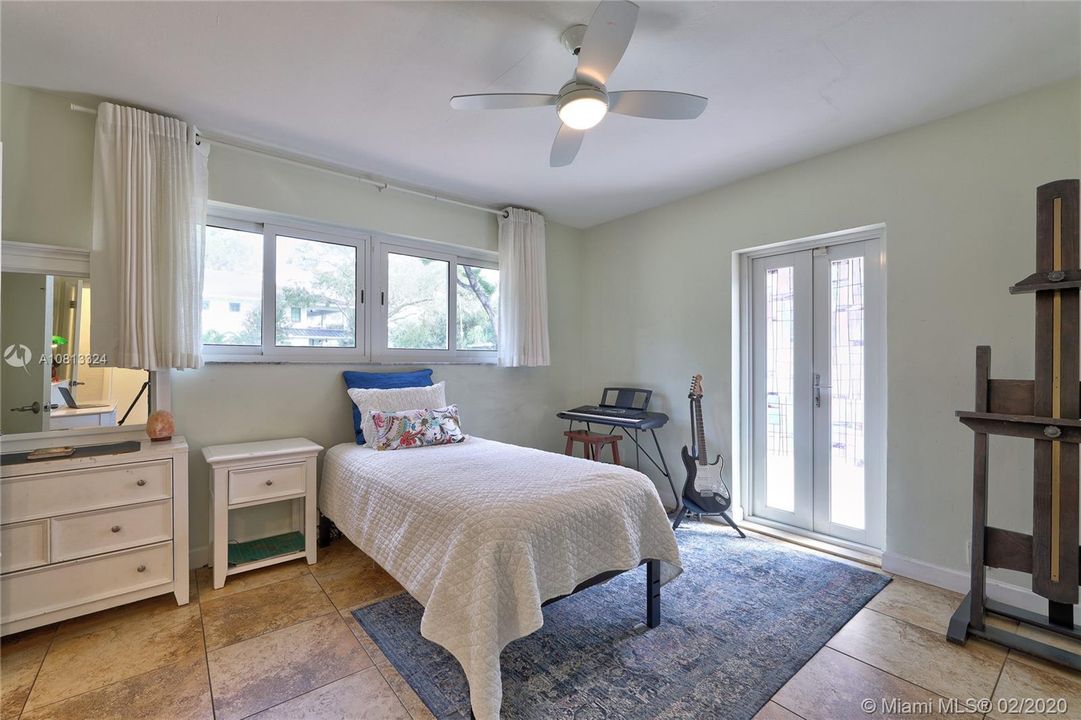 Large Bedroom (3) w/ French Doors leading to Patio