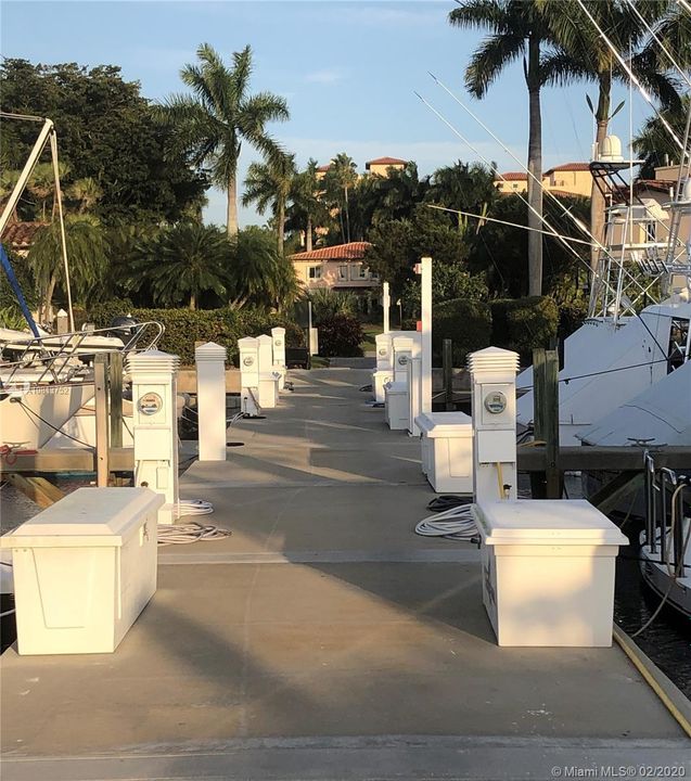 View walking away from boat slip towards parking lot and dockmaster office