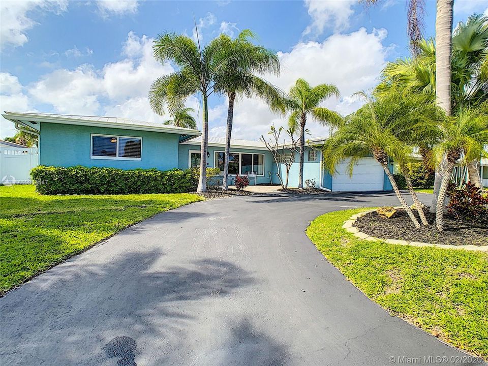 Entering the circular driveway to what can be your new home.