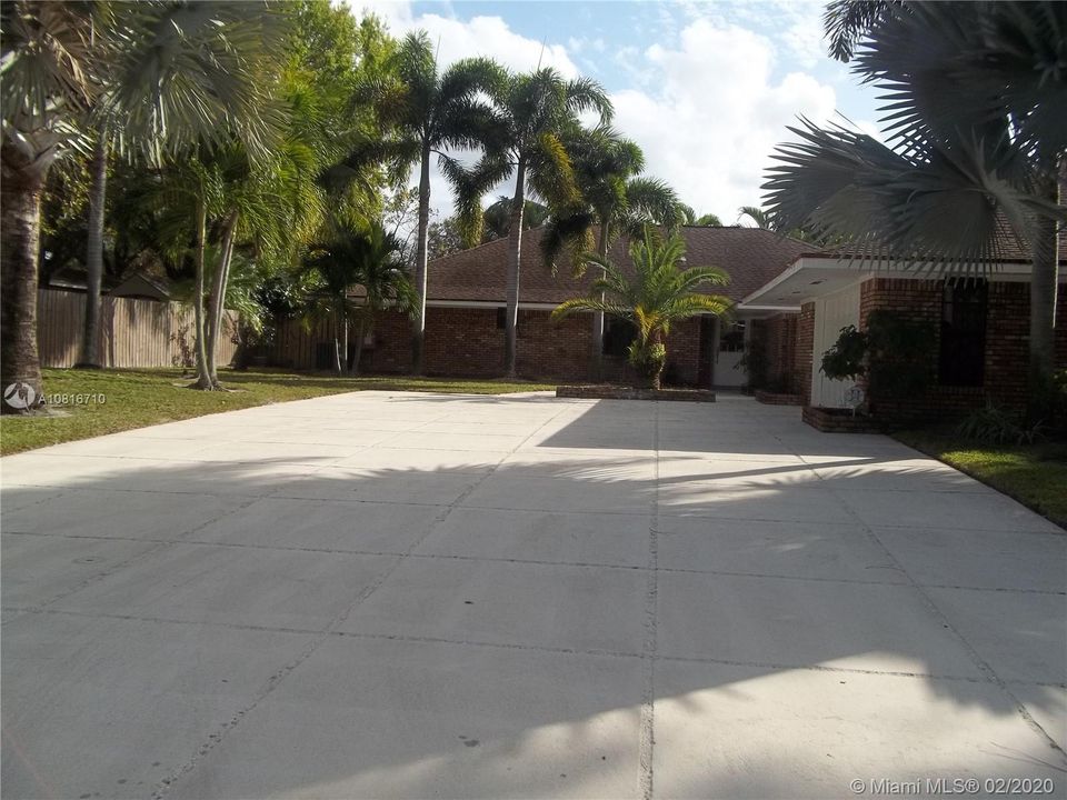 Expansive 30X60 ft driveway for your toys