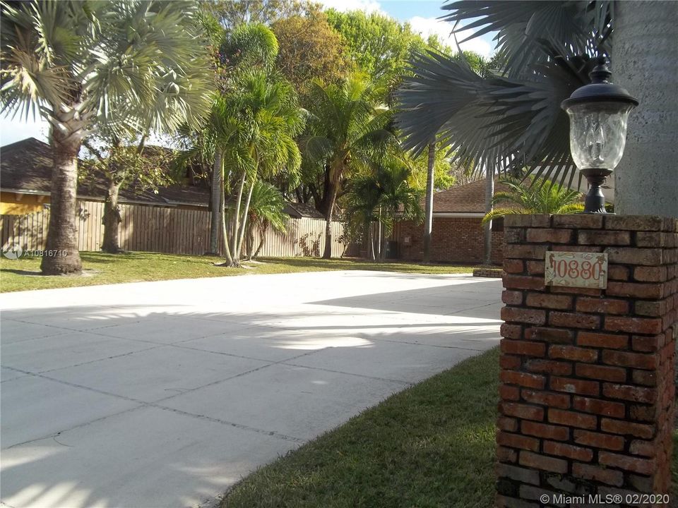 Beautiful brick columns & mature trees