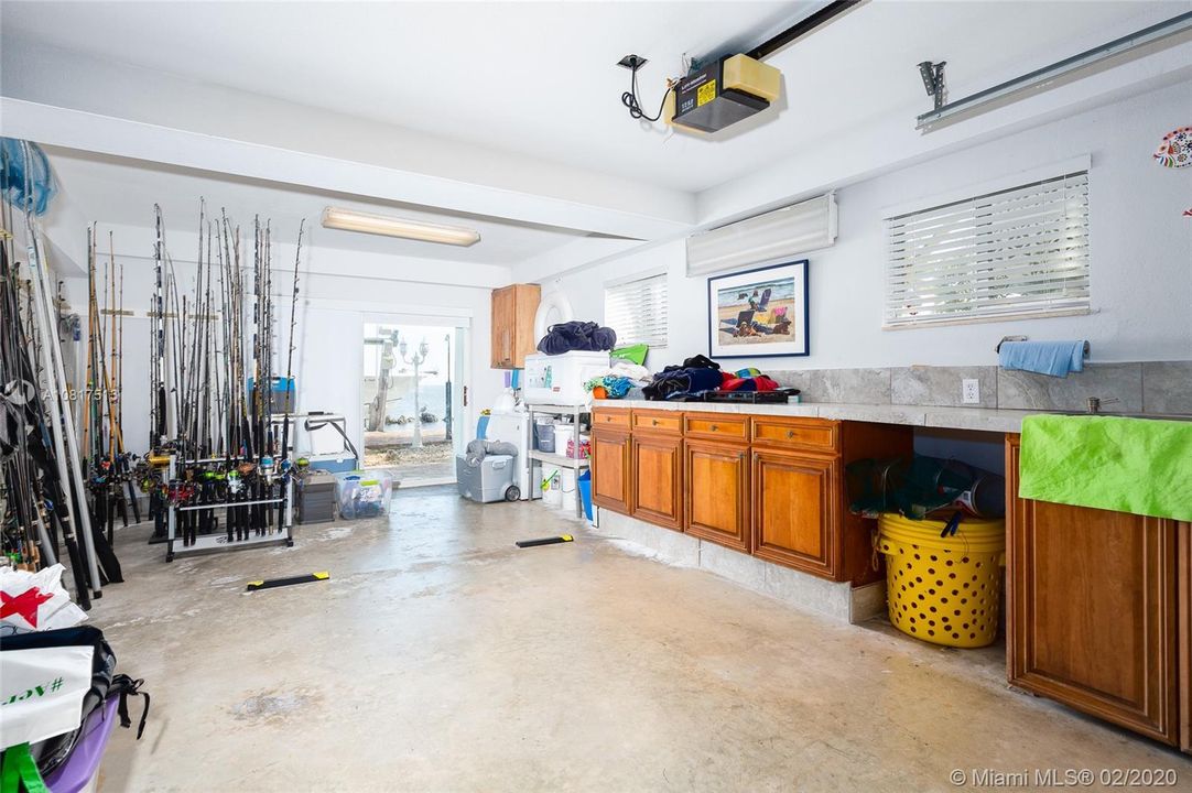 South garage with cabinets