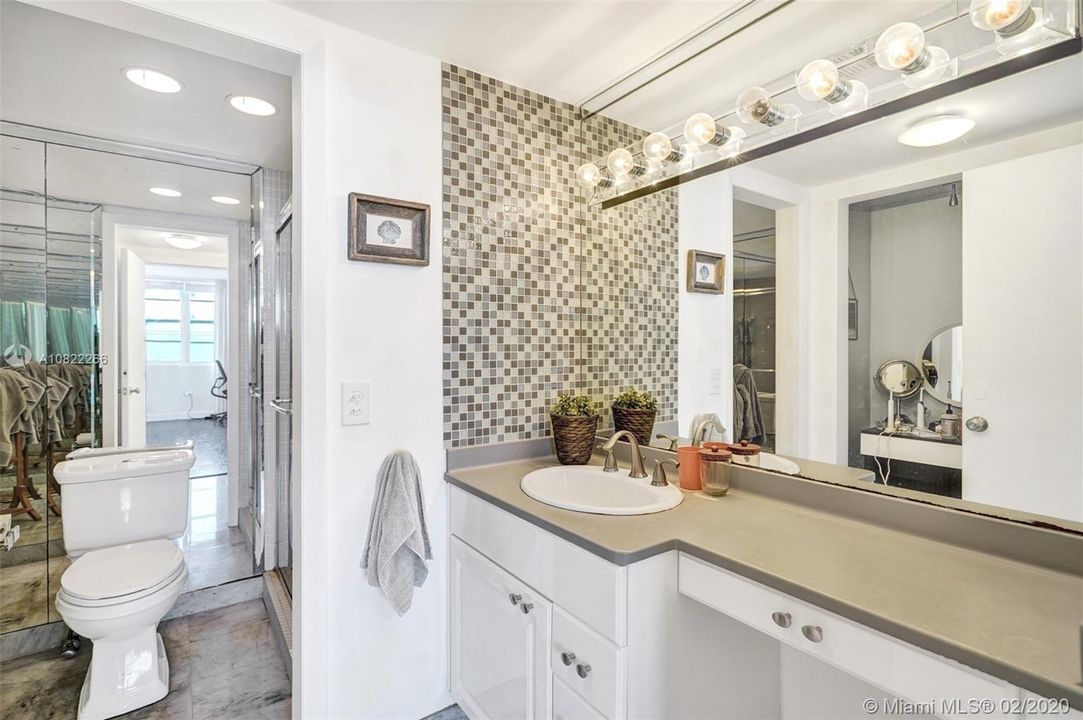 Master Bathroom with Glass shower door and Make up station