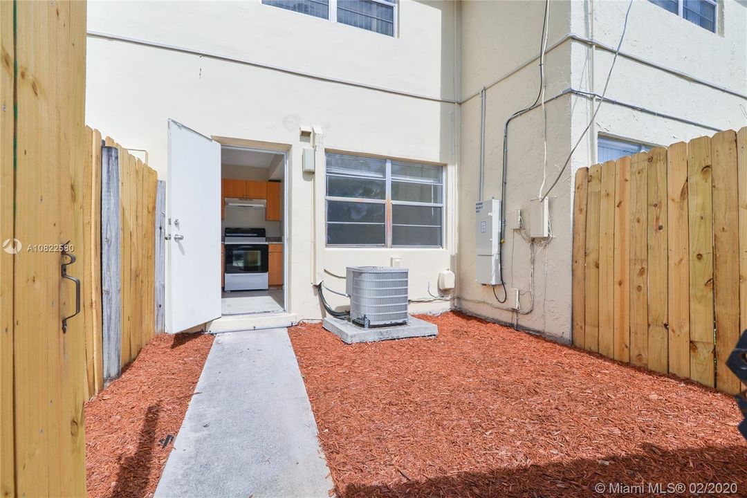 Patio with back door entry into kitchen
