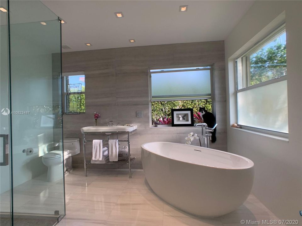 Luxurious master spa, no detail overlooked . Renovated 2019 with marble on floors, accent wall and shower walls and floor. Waterworks stand alone tub and filler and faucets.