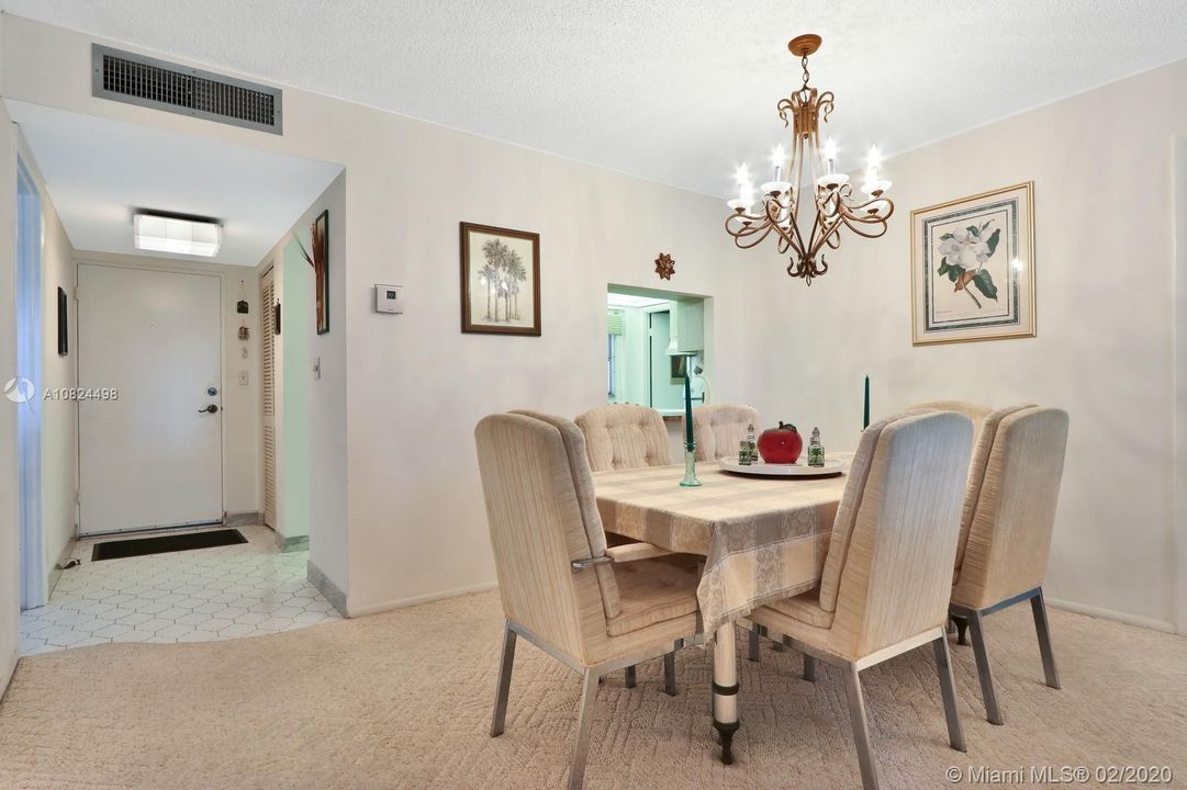 Dining Room Features Overpass Window to the Kitchen