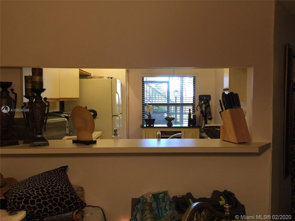 looking from the dining area into the kitchen