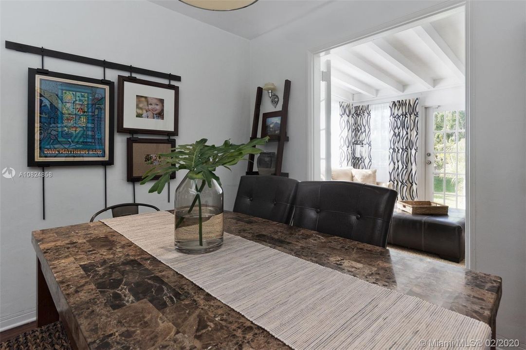 Dedicated formal dining space teaming with natural light.