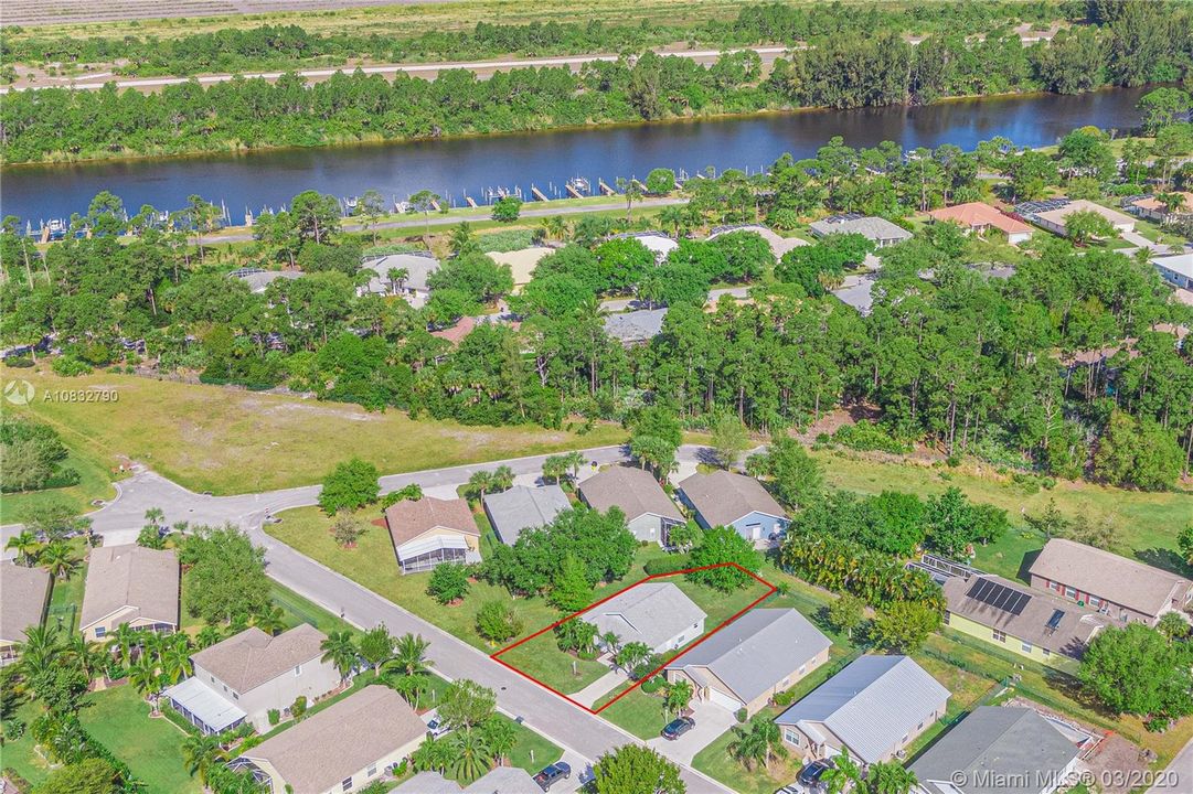 Ariel view of the home, Saint Lucie waterway with boat ramp.