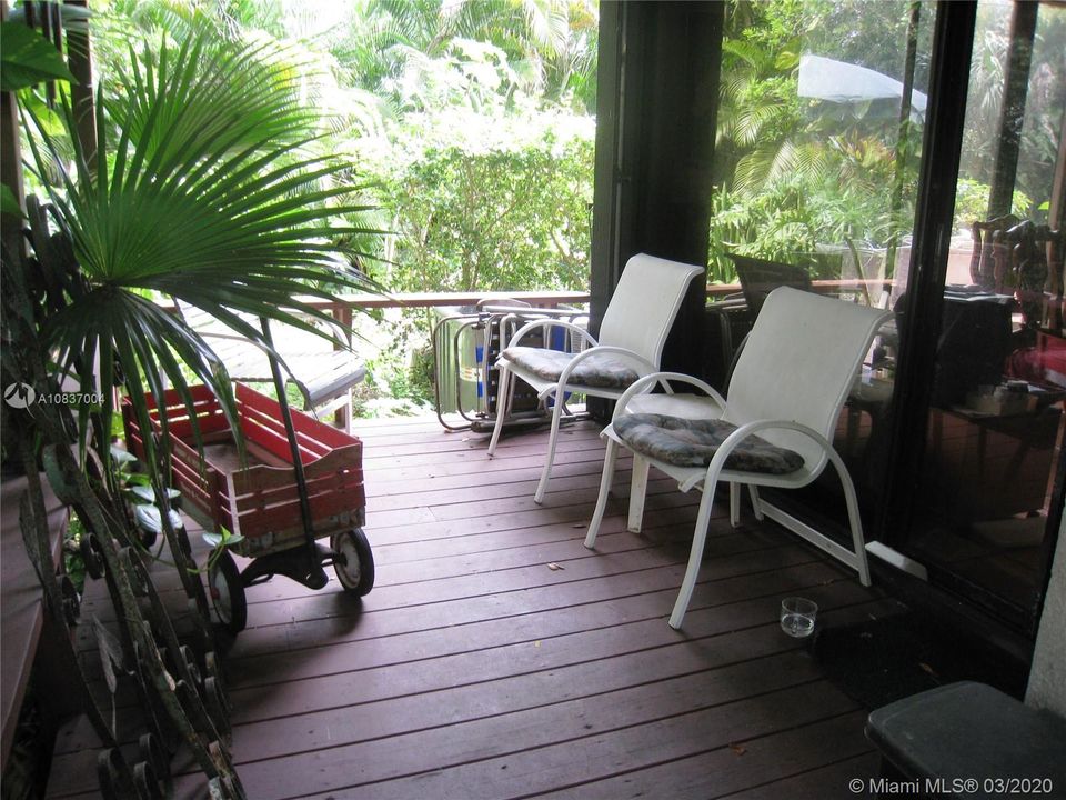 Country-like wood open porch on north side of house