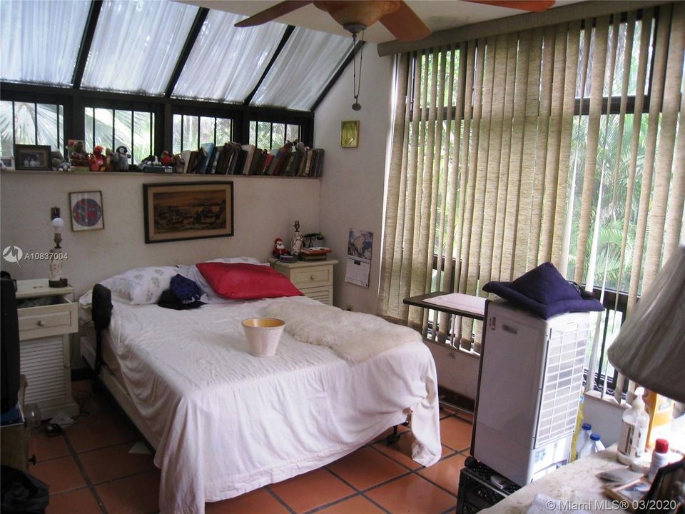Upstairs master bedroom ; lots of windows