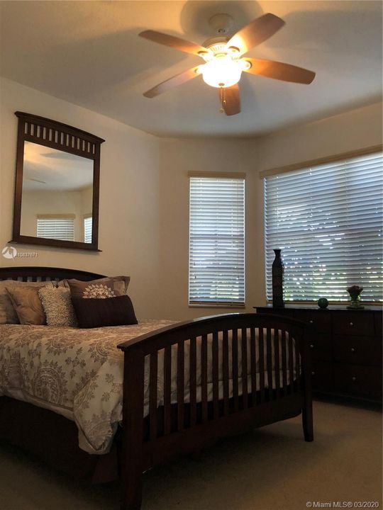 Upstairs bedroom #4 with bay window view of the front of the home. Shares a jack and jill bathroom with upstairs bedroom # 3