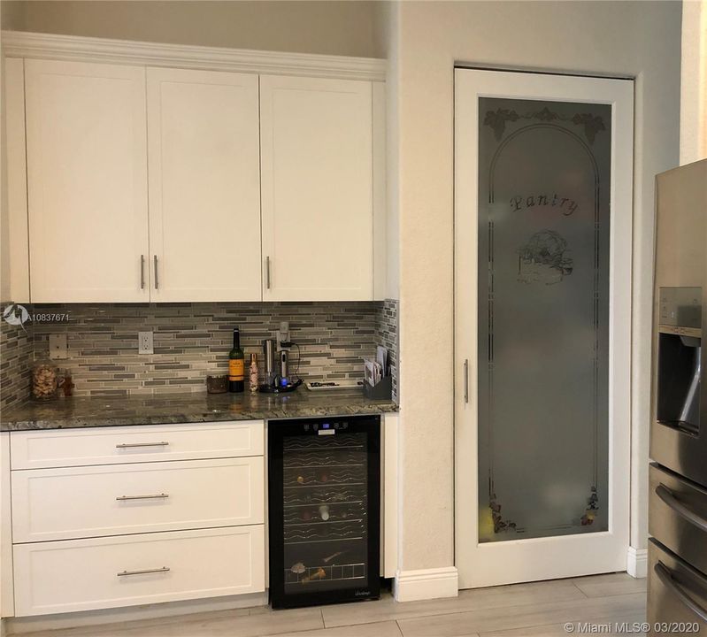 Pantry, extra storage and counters and wine fridge included.