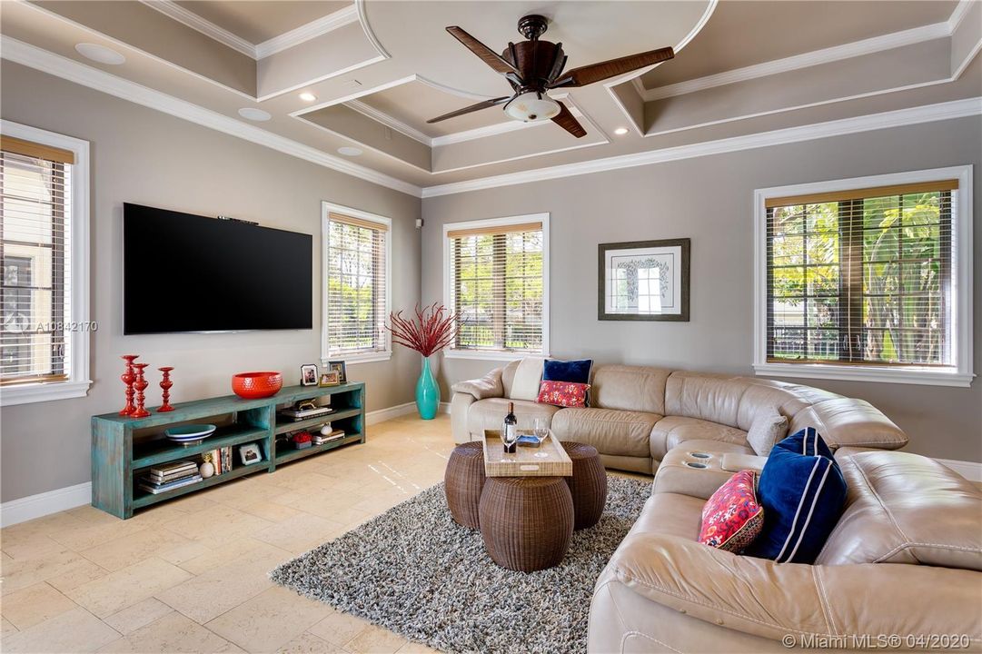 Family room with ornamental ceiling details