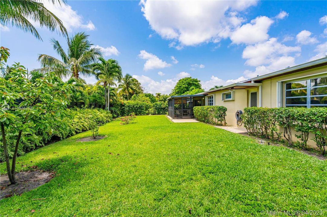Beautiful and very spacious yard with room to build pool.  Master bedroom's bathroom has door connecting to the patio (can be used as a "cabana bath").