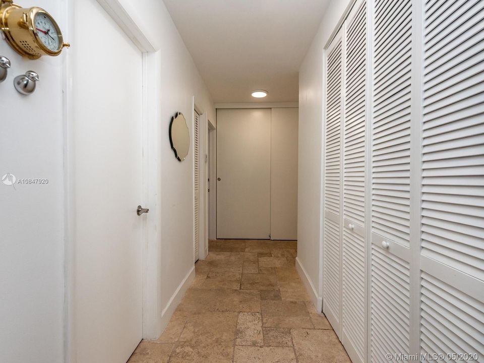 Hallway to Guest suite and garage areas