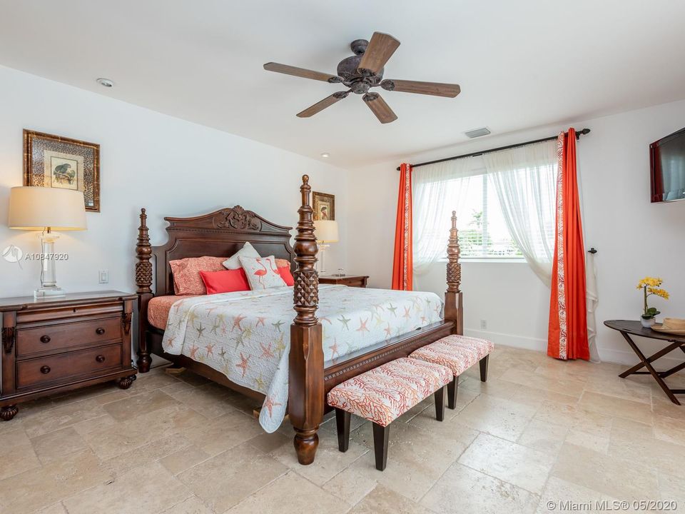 Master suite with an elegant tropical touch
