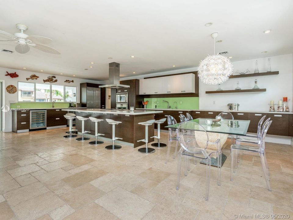 Open concept kitchen, dining and living area