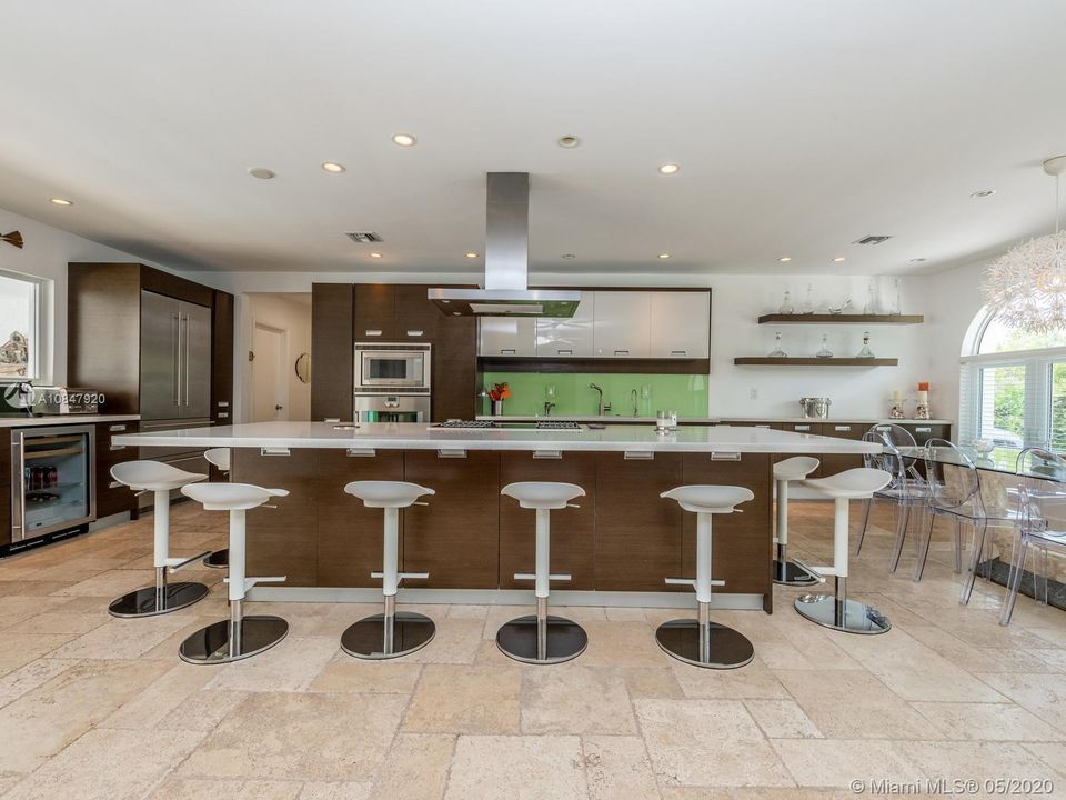 Large kitchen with quartz center island and plenty of seating