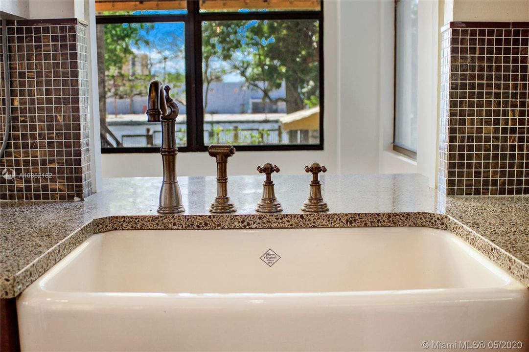 Farmhouse Sink with period-style fixtures.