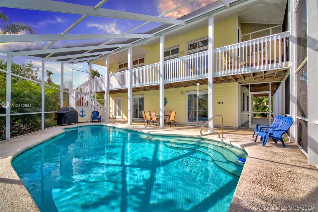 Two story screened in pool and porch.