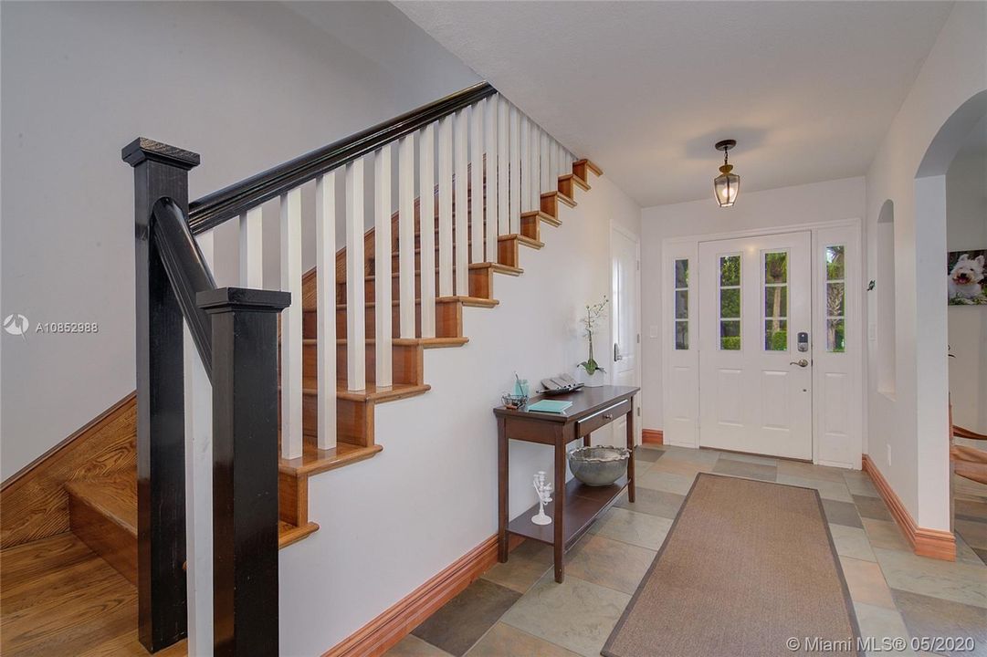 First Floor Foyer - Large closet as you walk in currently used as an owners closet with supplies.