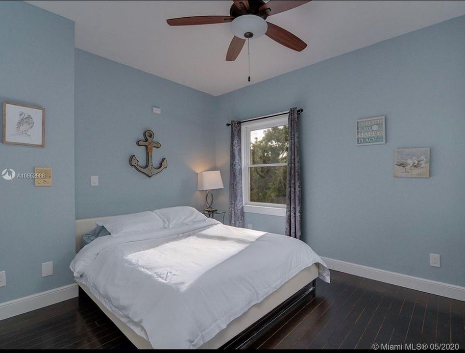 2nd Floor Guest Bedroom - Bathroom located outside bedroom door in hallway.