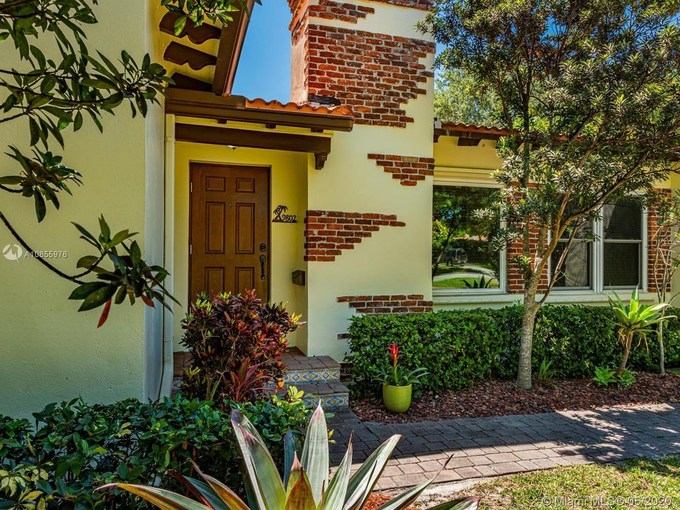 Unique curb appeal with patchwork brick details