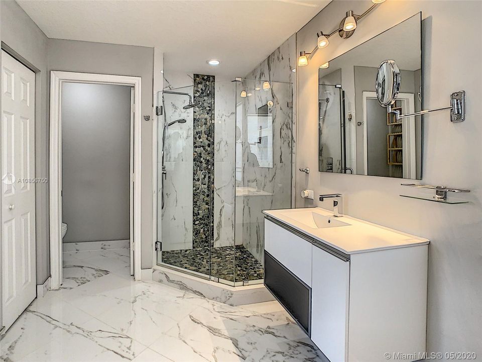 master bath with his and hers sinks